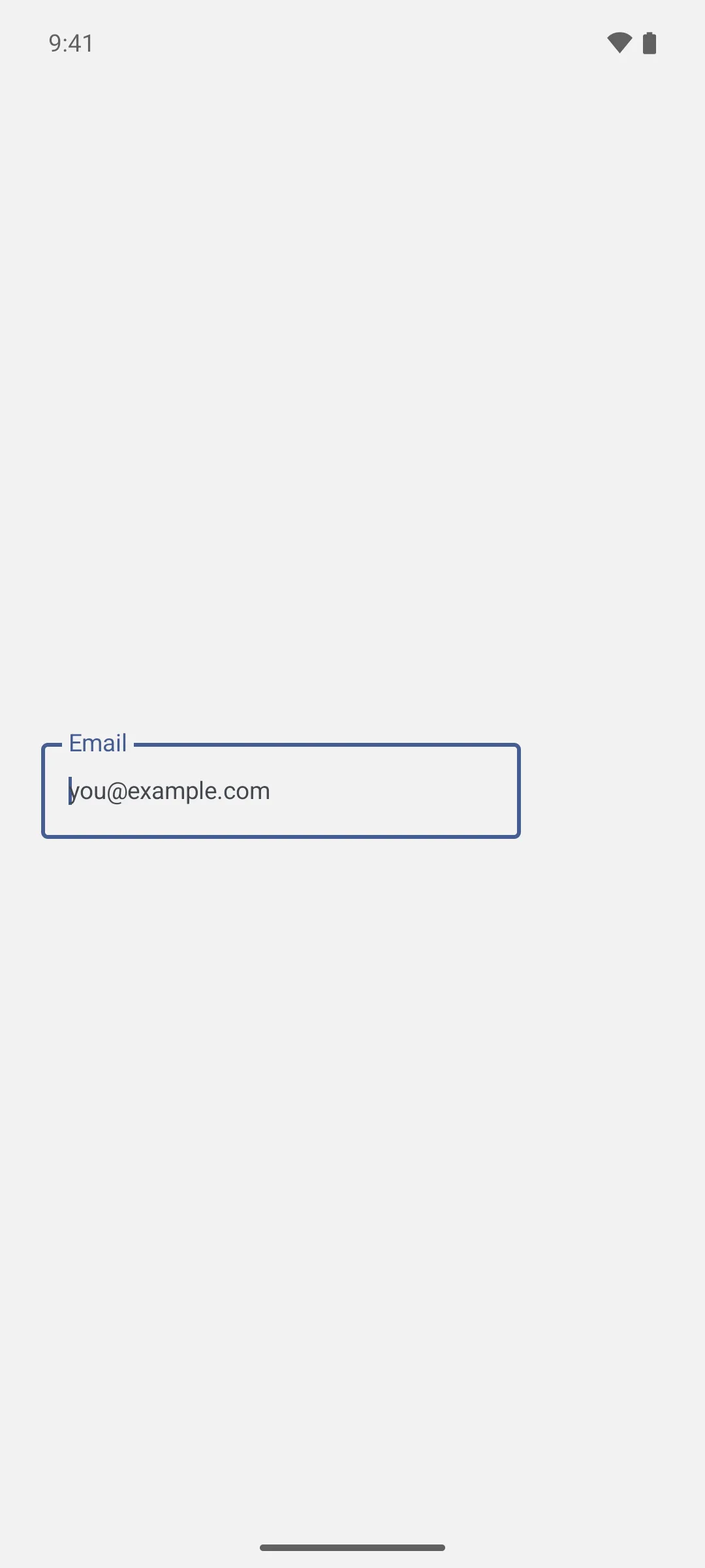 A focused outlined text field with the Email label in the border notch and a placeholder