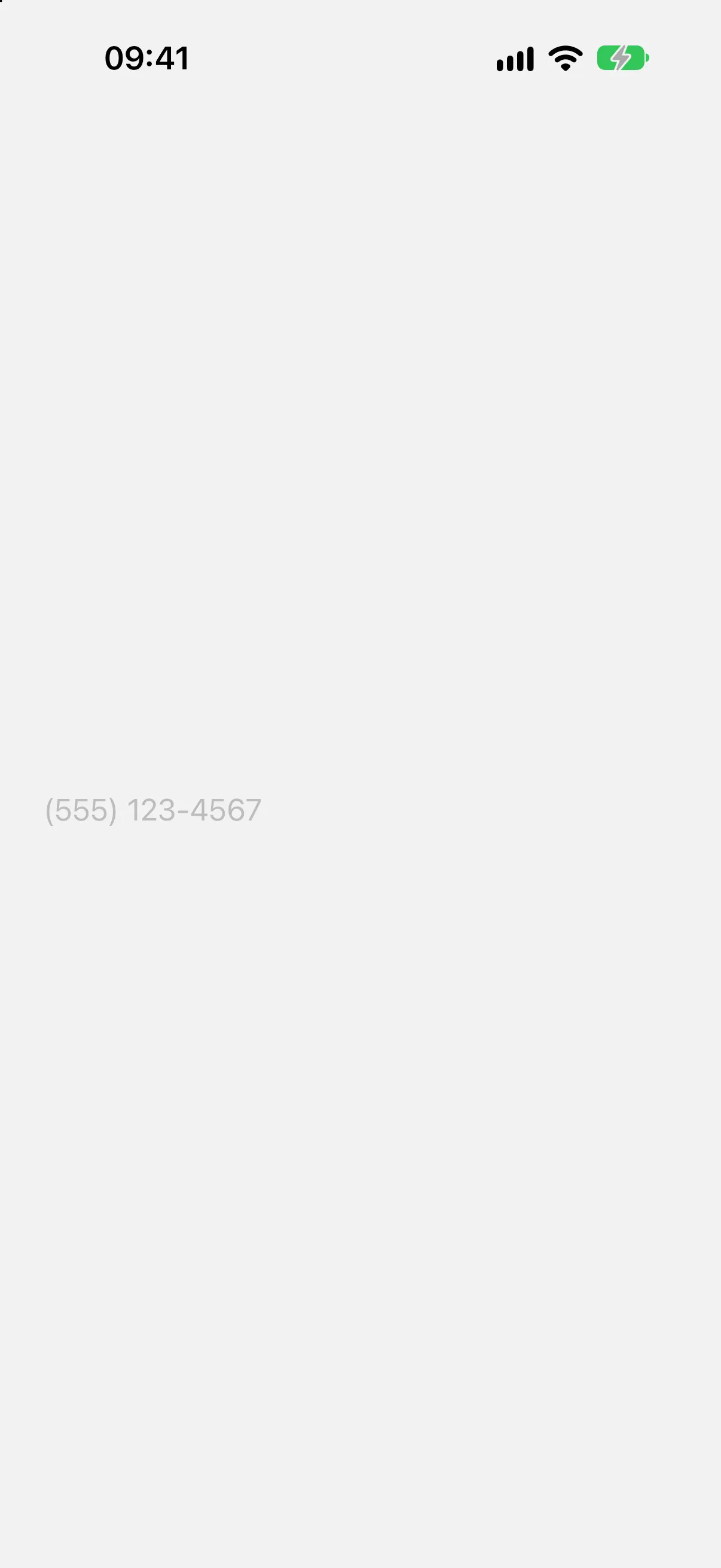 An empty text field showing the placeholder formatted as a phone number